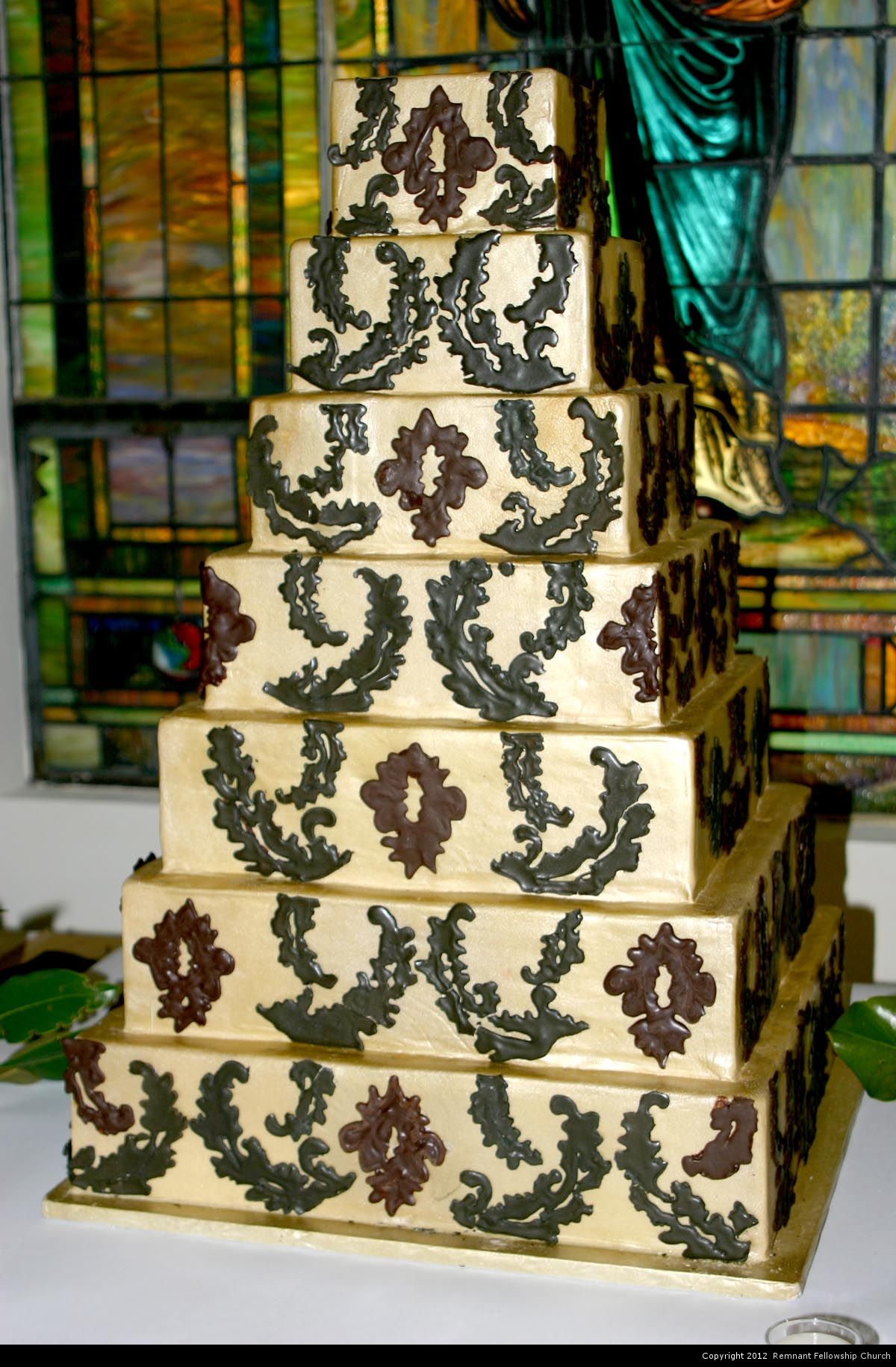 Fall Formal Seven-Tiered Wedding Cake | Gold with Olive Wreath Accents