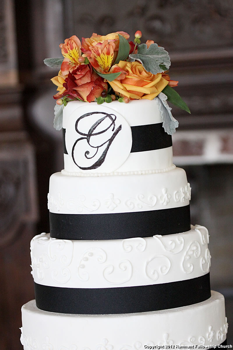 Wedding Cake Inspiration | White Five-Tiered Wedding Cake with Black Ribbon and Monogram
