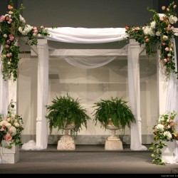 Spring Wedding Chuppah | White Linen with Large Flower Arrangement