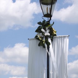 Spring Wedding Entrance Decoration | Lamppost with White Linen Banner and Magnolia