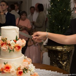 Summer Wedding Cake | Tiered White Wedding Cake with Coral and Peach Flower Accents
