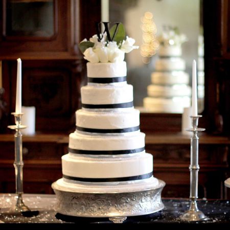 Walston Covenant Wedding Wedding Cake Inspiration | White Five-Tiered Wedding Cake with Black Ribbon