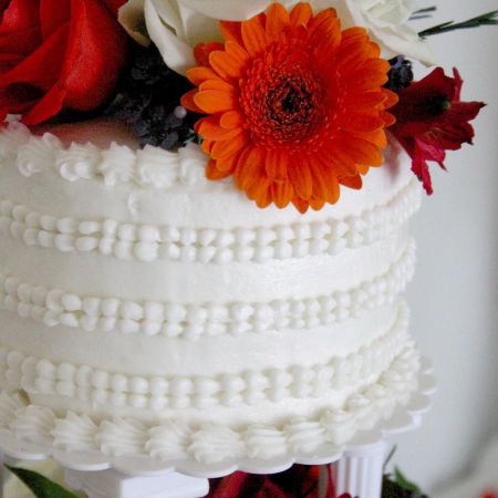 Fall Wedding Cake Inspiration | Raised Top Tier with Burnt Orange and White Flowers