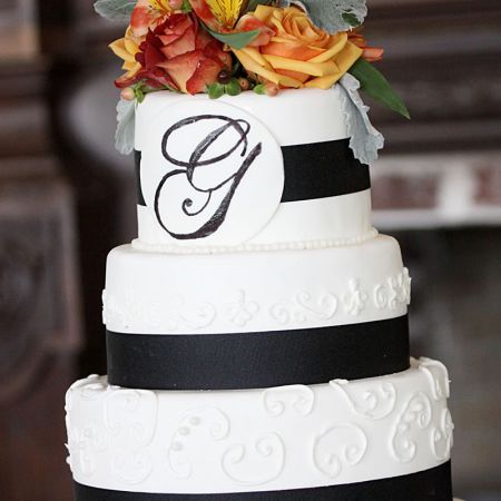 Gadke/McHaney Covenant Wedding Wedding Cake Inspiration | White Five-Tiered Wedding Cake with Black Ribbon and Monogram