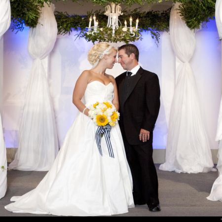 Summer Wedding Chuppah | White Draping Linen with Bright Flowers and Hanging Ivy