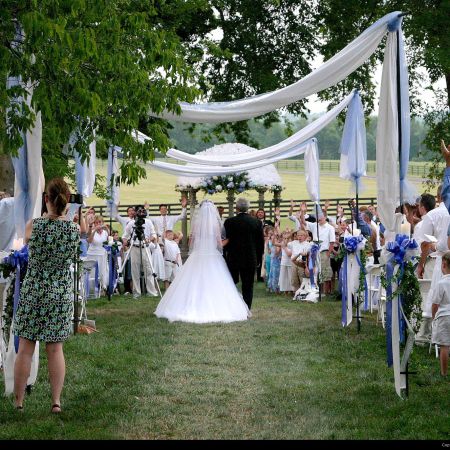 Processional - Remnant Fellowship Summer Wedding Aisle Decorations | White Hanging Linen with Blue Accents