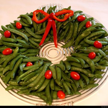 Winter Wedding Reception Food | Snow Pean Wreath and Cherry Tomato Roses