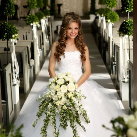 Spring Bride with Cascading Ivy and White Rose Bouquet