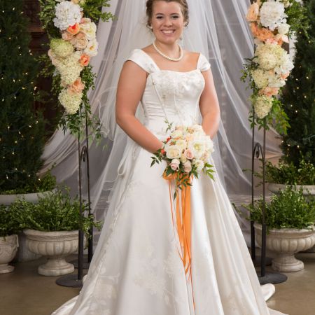 Willy/Shangle Covenant Wedding Summer Wedding Bride | White Traditional Lace Dress with Cap Sleeves. White Bouquet and Orange Ribbon