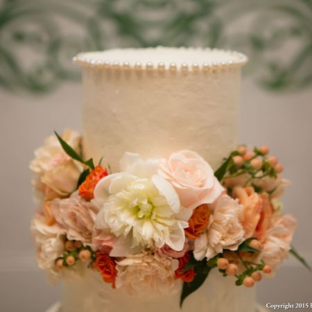 Summer Wedding Cake | Tiered White Wedding Cake with Coral and Peach Flower Accents