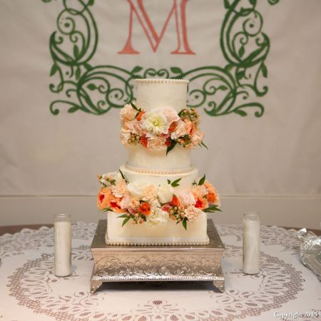 Summer Wedding Cake | Tiered White Wedding Cake with Coral and Peach Flower Accents