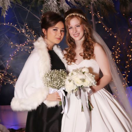 Formal Winter Wedding Bridesmaid Portrait | Black Bridesmaid Dresses with White Fur Shaw