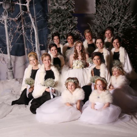 Formal Winter Wedding Bridesmaid Portrait | Black Bridesmaid Dresses with White Fur Shaw