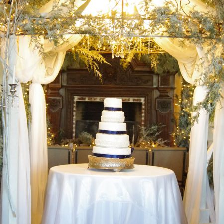 Day/Ancona Covenant Wedding January Winter White and Navy Wedding Cake with Chuppah