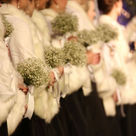 Formal Winter Wedding Bridesmaid Portrait | Black Bridesmaid Dresses with White Fur Shaw | Baby's Breath Bouquet