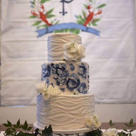 Sims/Petralito Remnant Wedding -Three Tired Wedding Cake with a blue marble floral design and white textured buttercream by Remnant Fellowship Cake Committee