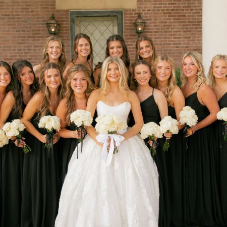MartinHahn Covenant Wedding Classy Black Spaghetti Strap Bridesmaid dresses with white rose bouquets