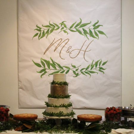 Holmes/VanDonsel Covenant-Wedding Holmes VanDonsel Remnant Fellowship Covenant Wedding , White and GoldWedding Cake With Greenery