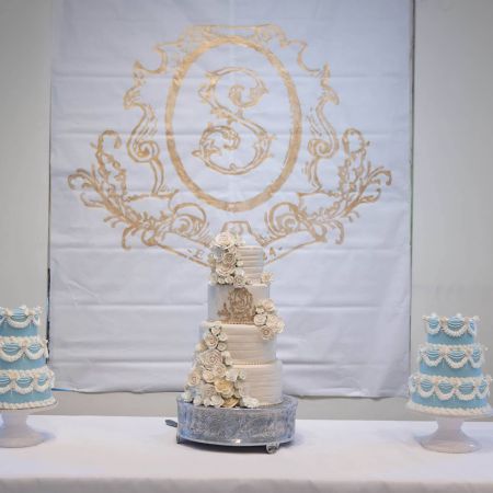 Stites/Shepherd Remnant Fellowship Covenant Wedding- White Wedding Cake with Intricate designs, white florals and gold monogram by Remnant Fellowship Cake Committee