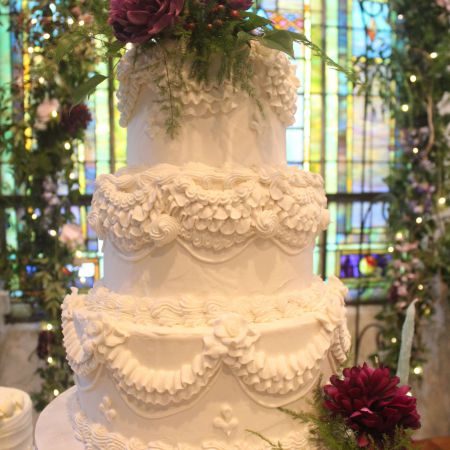 Flahavan/Kurtz Covenant Wedding Whimsical White Wedding cake with detailed piping and a pop of purple flowers