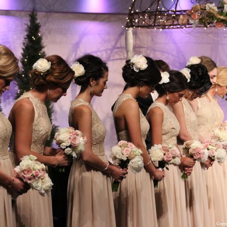Spring Wedding Bridesmaid Chignon Hairstyle with Flower Accessory