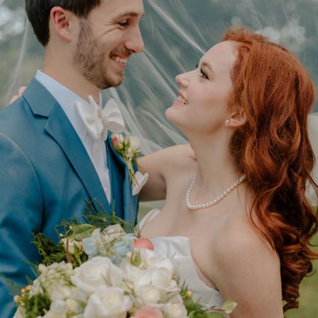 A Summer Floral Arrangement with Coral and Light blue accents by the Remnant Fellowship Floral Team