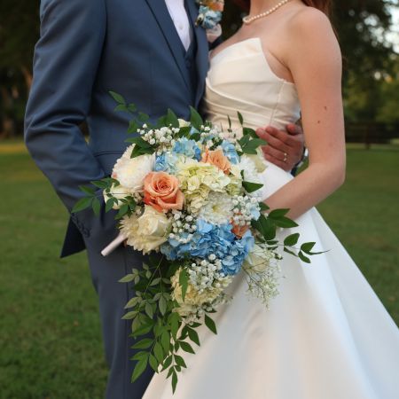 Remnant Fellowship Wedding Bouquet with Coral and Light Blue touches