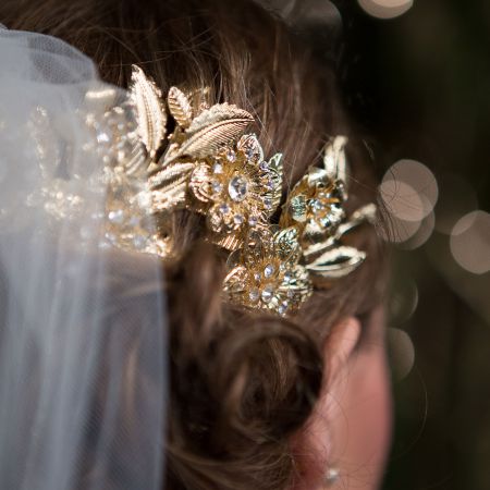 Formal Fall Bridal Wedding Hair Chignon with Gold and Bronze Hair Accessory and Veil