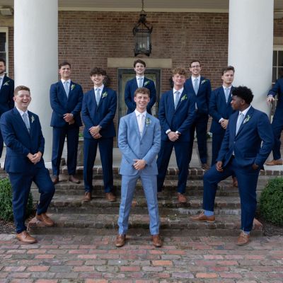 Summer Groomsmen Party wearing airy navy blue suits