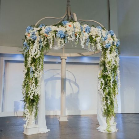 Weaver/Purdy Covenant Wedding Wedding Chuppah with Wisteria and blue hydrangeas decorated by our Remnant Fellowship Decorating Committee