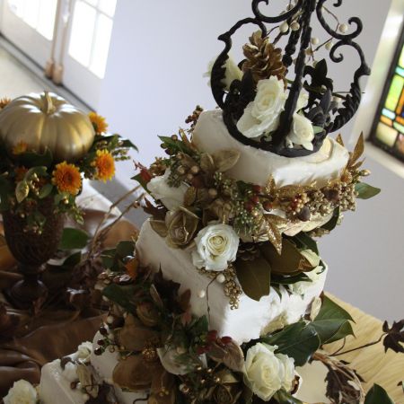 Fall Harvest Formal Wedding Cake | Square-Tiered Cake with Fall Foliage and Brass Crown Cake Topper