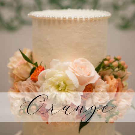 Summer Wedding Cake | Tiered White Wedding Cake with Coral and Peach Flower Accents